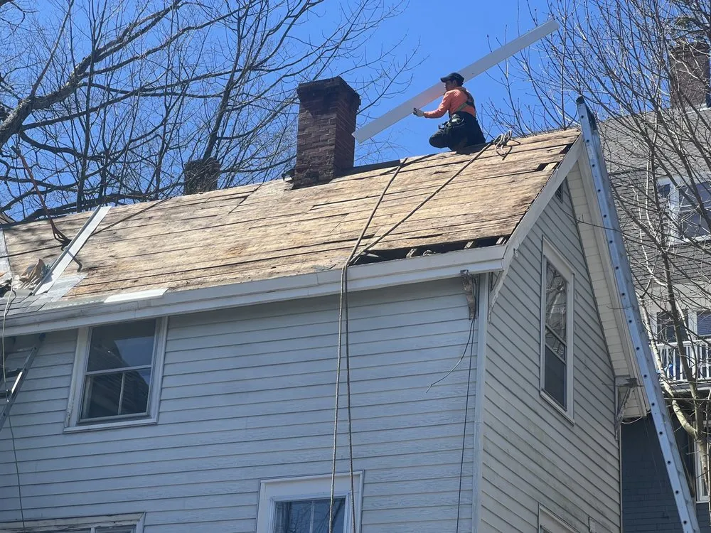 Slide of Spartan Roofing