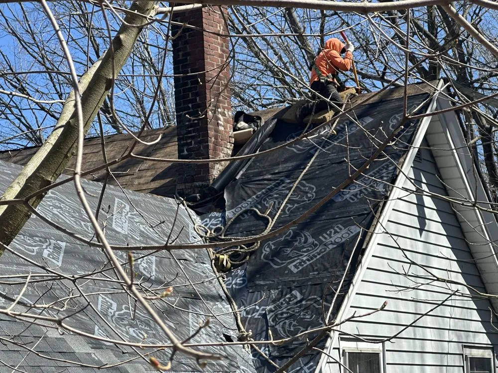 Slide of Spartan Roofing