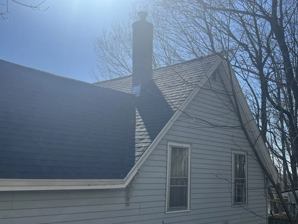 Slide of Spartan Roofing