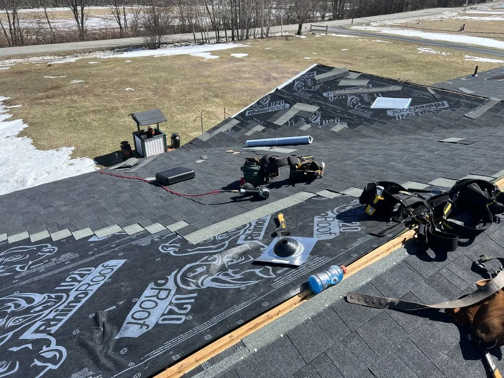 Slide of Spartan Roofing