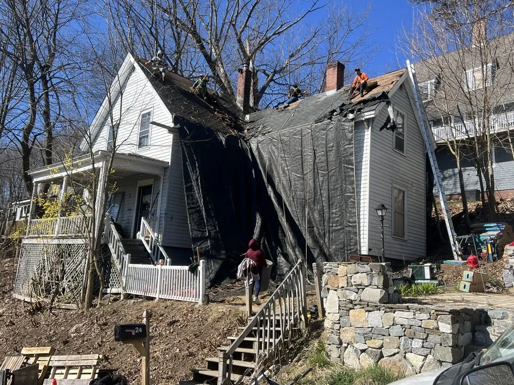 Slide of Spartan Roofing