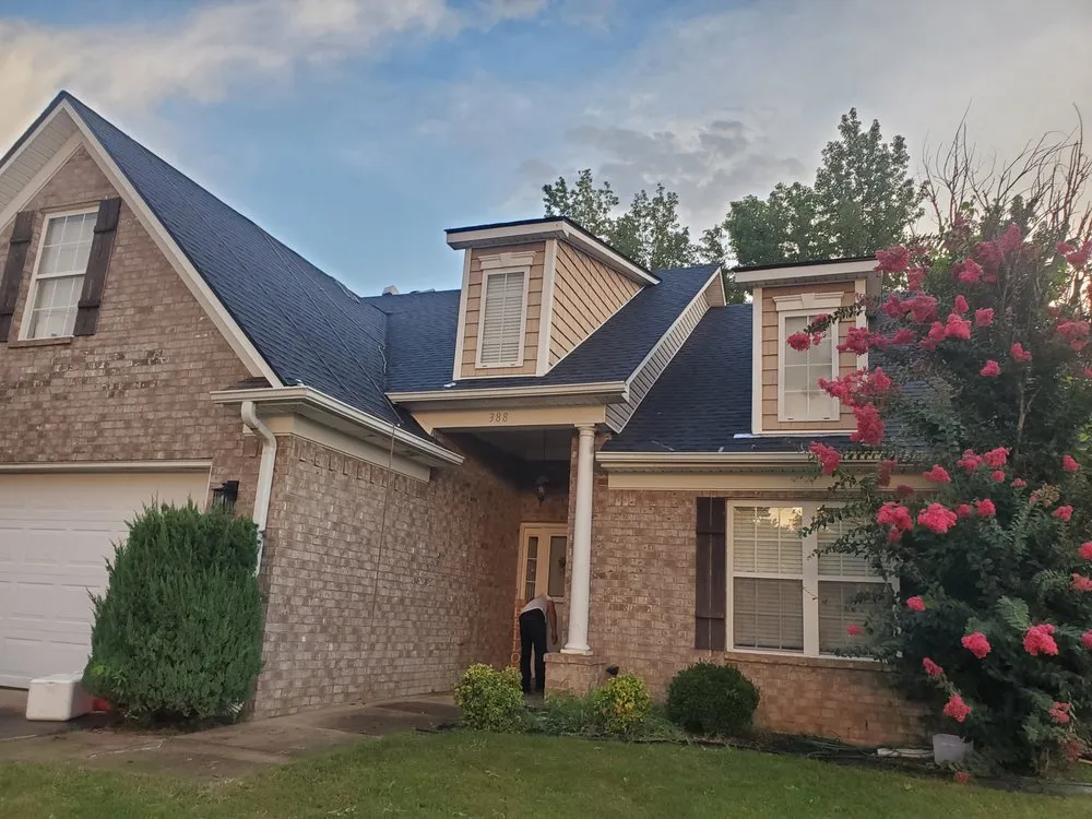 Slide of Spartanos Roofing