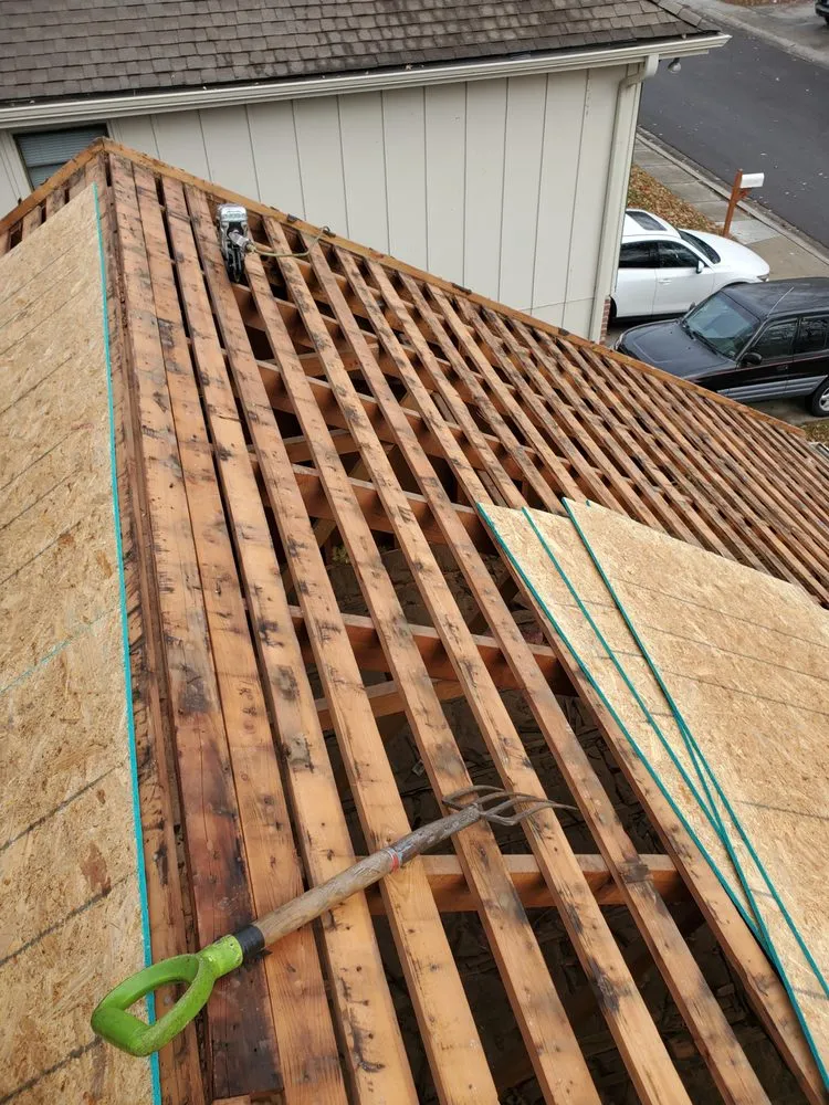 Slide of Spartanos Roofing