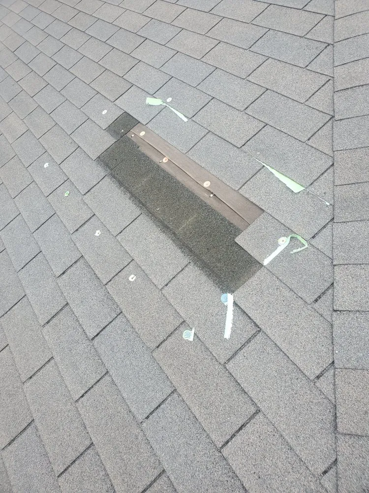 Slide of Spartanos Roofing