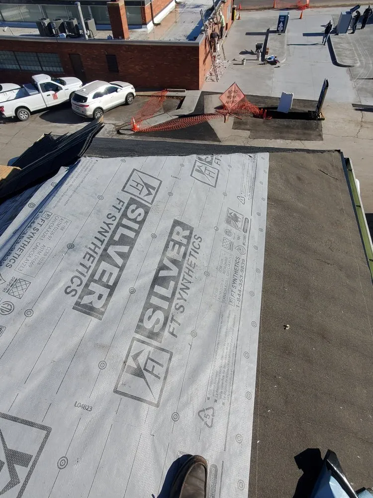 Slide of Spartanos Roofing