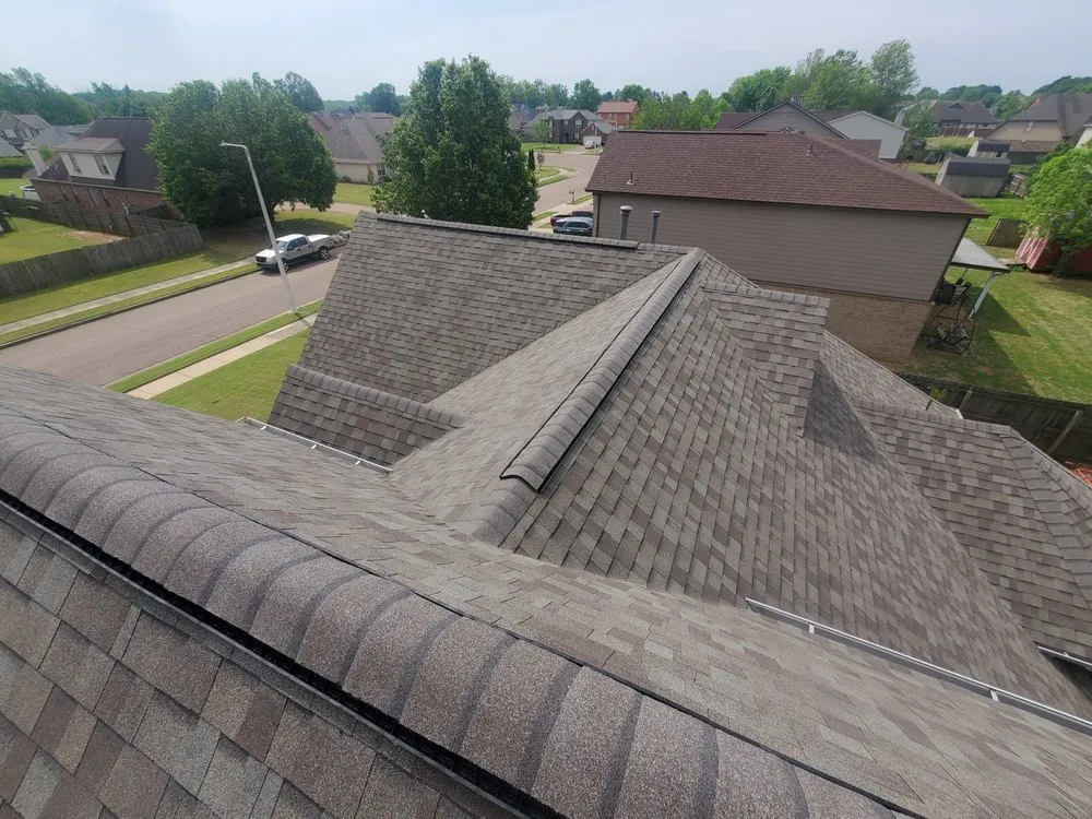 Slide of Spartanos Roofing