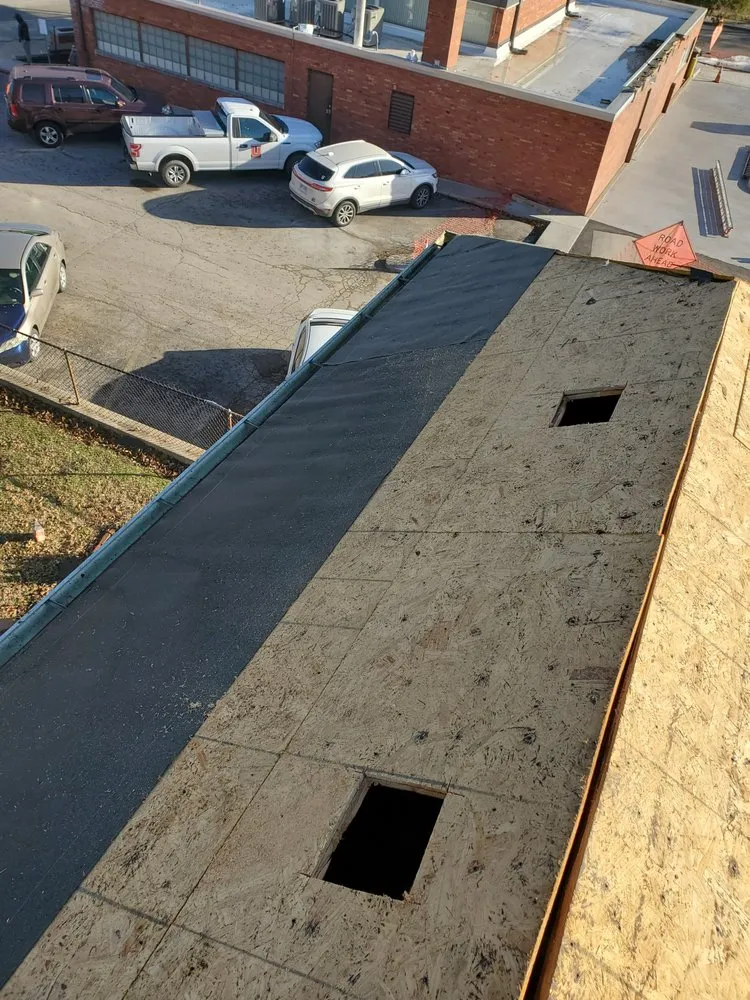 Slide of Spartanos Roofing