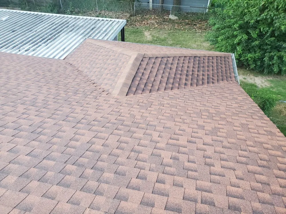 Slide of Spartanos Roofing