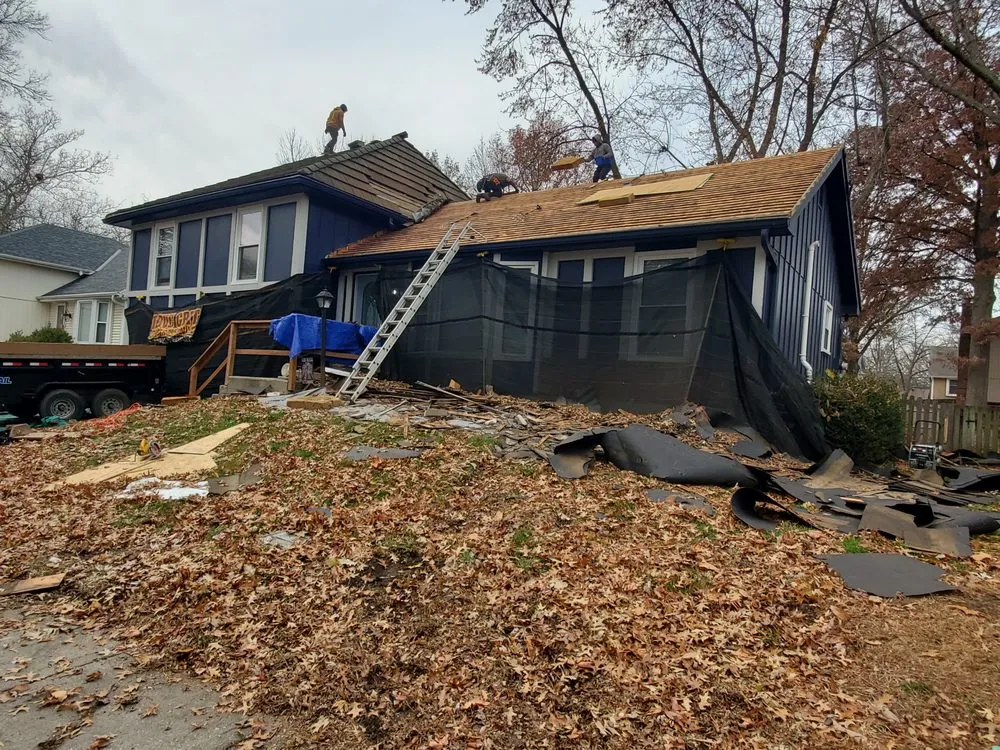 Slide of Spartanos Roofing