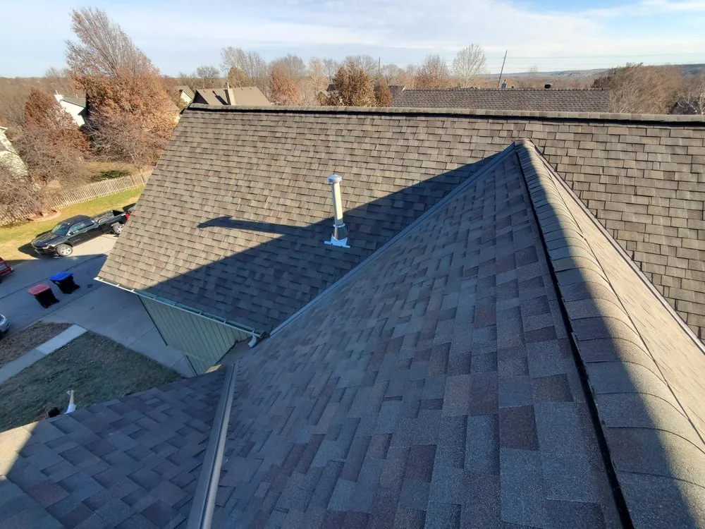 Slide of Spartanos Roofing