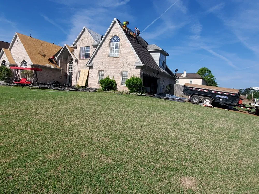 Slide of Spartanos Roofing