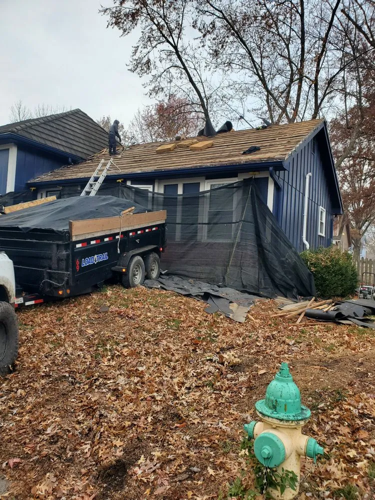 Slide of Spartanos Roofing
