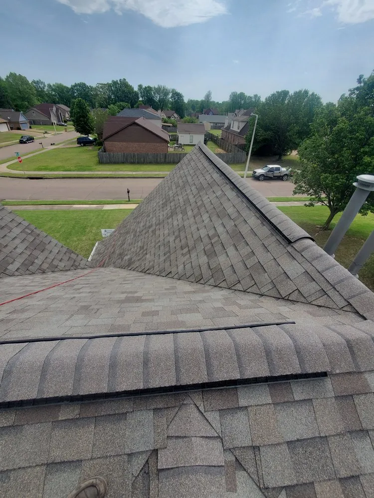 Slide of Spartanos Roofing