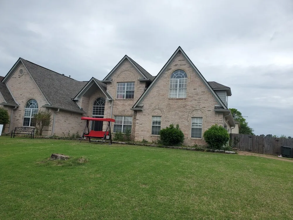 Slide of Spartanos Roofing