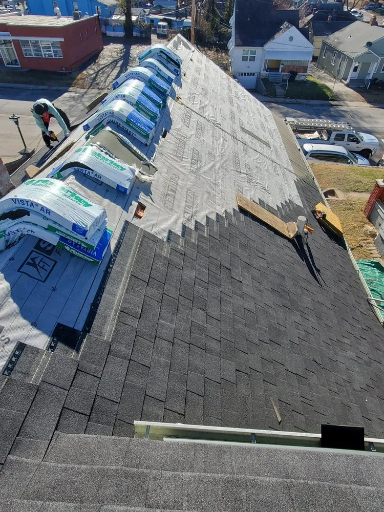 Slide of Spartanos Roofing