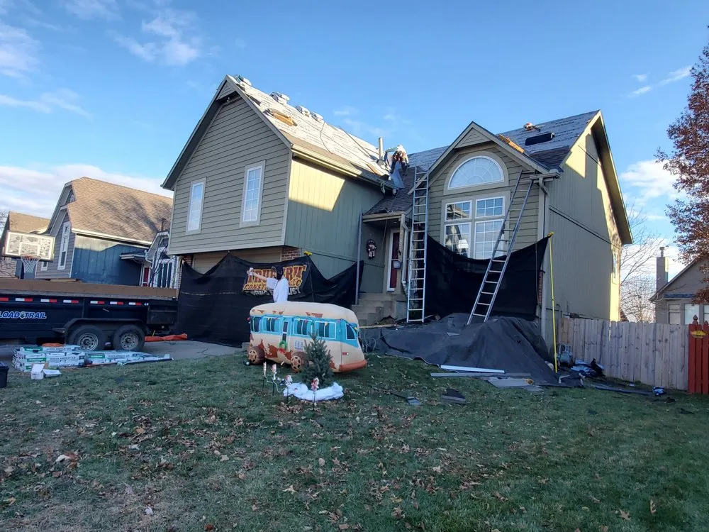 Slide of Spartanos Roofing