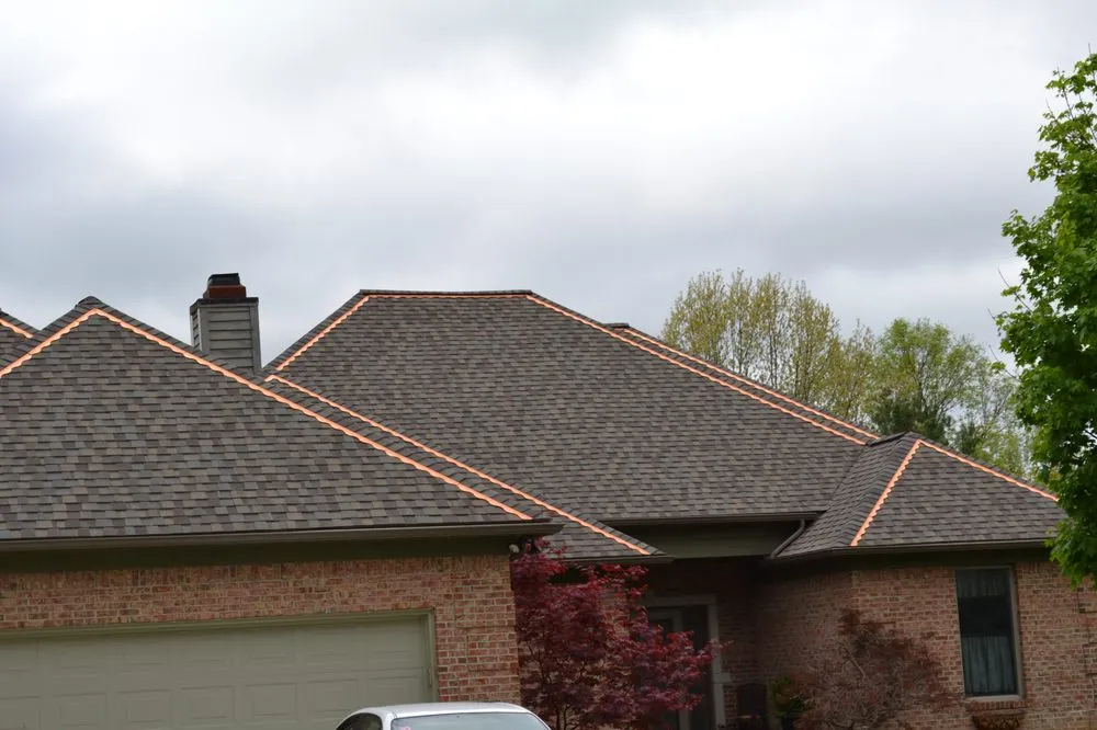 Slide of Spencer Roofing