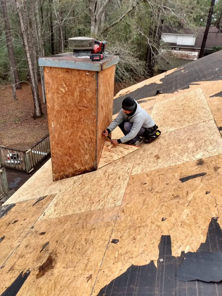 Slide of Spencer Roofing Solutions