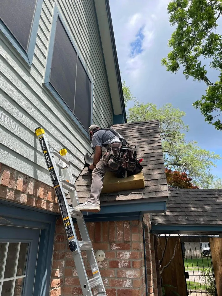 Slide of Spencer Roofing Solutions