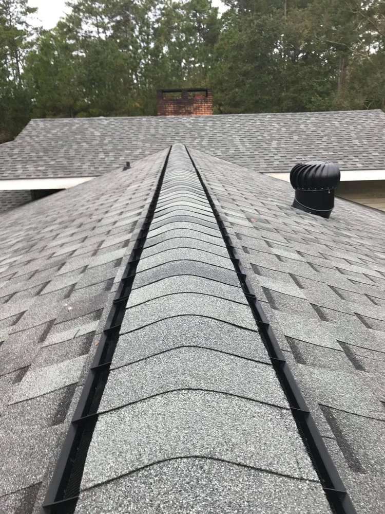 Slide of Spencer Roofing Solutions