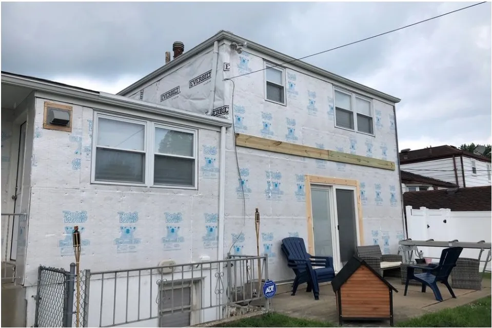 Slide of Spennato family Roofing