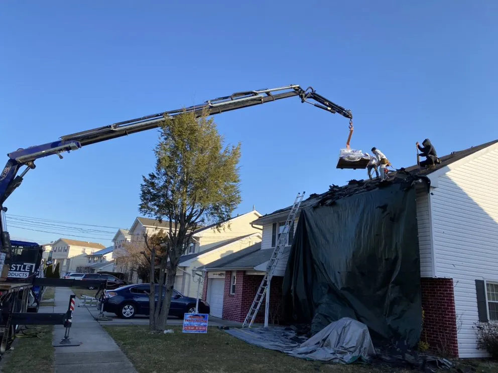 Slide of Spennato family Roofing