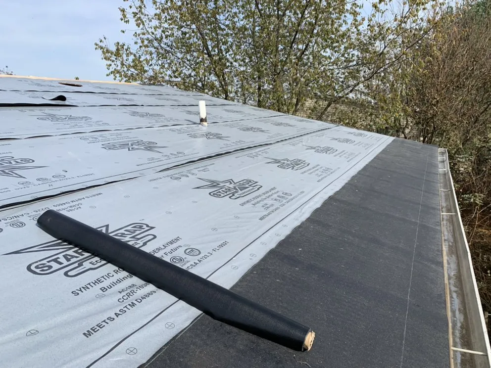 Slide of Spennato family Roofing