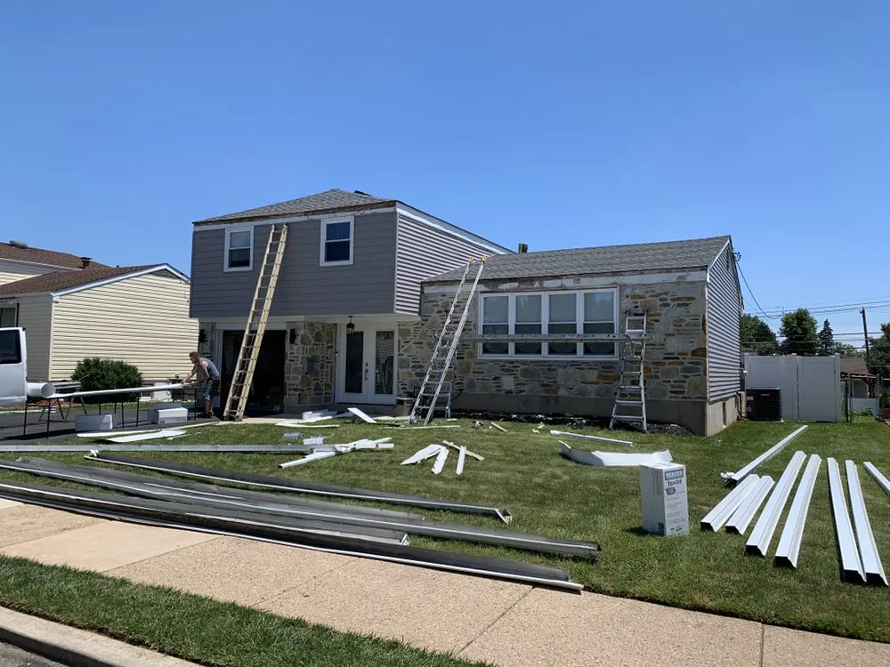 Slide of Spennato family Roofing