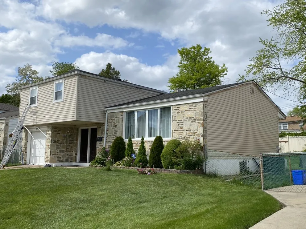 Slide of Spennato family Roofing