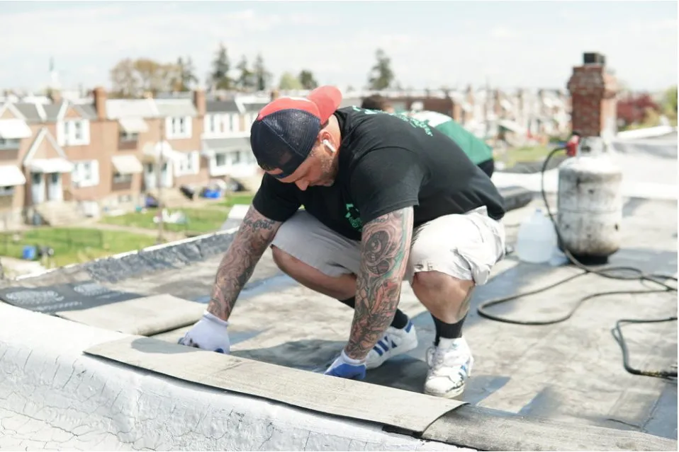 Slide of Spennato family Roofing