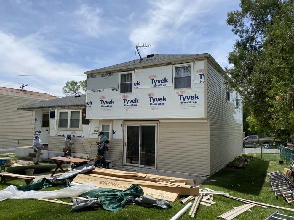 Slide of Spennato family Roofing