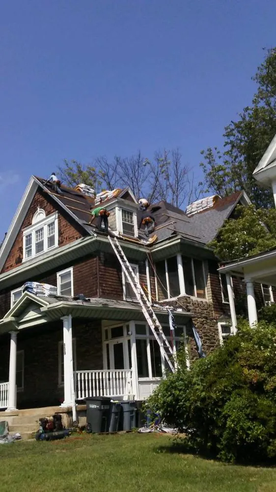 Slide of Spennato family Roofing