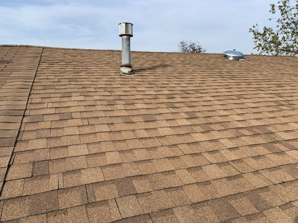 Slide of Spennato family Roofing