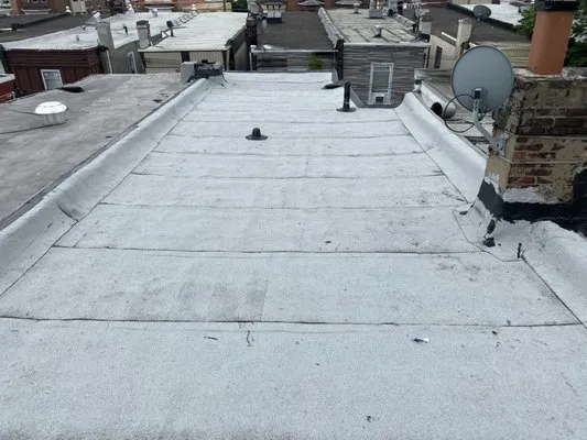 Spennato family Roofing Logo