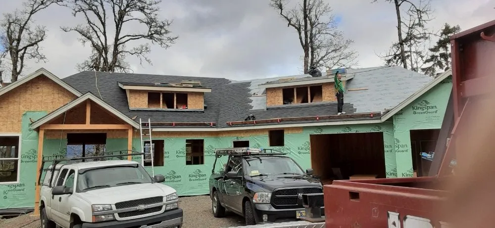 Slide of Spicer Roofing and Construction