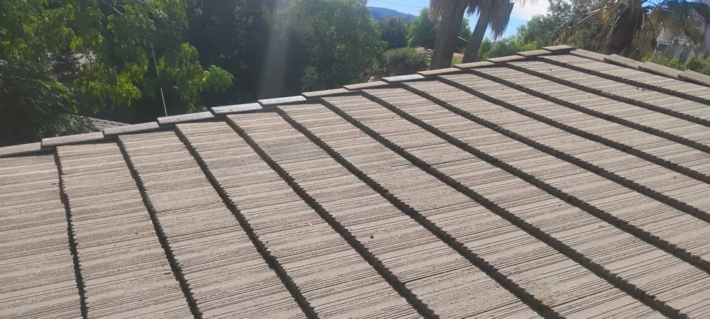 Slide of Spikes Roofing