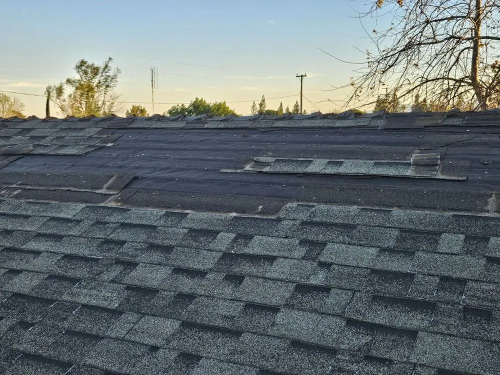 Slide of Spikes Roofing