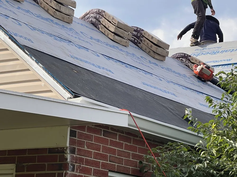 Slide of Spire Roofing & Exteriors