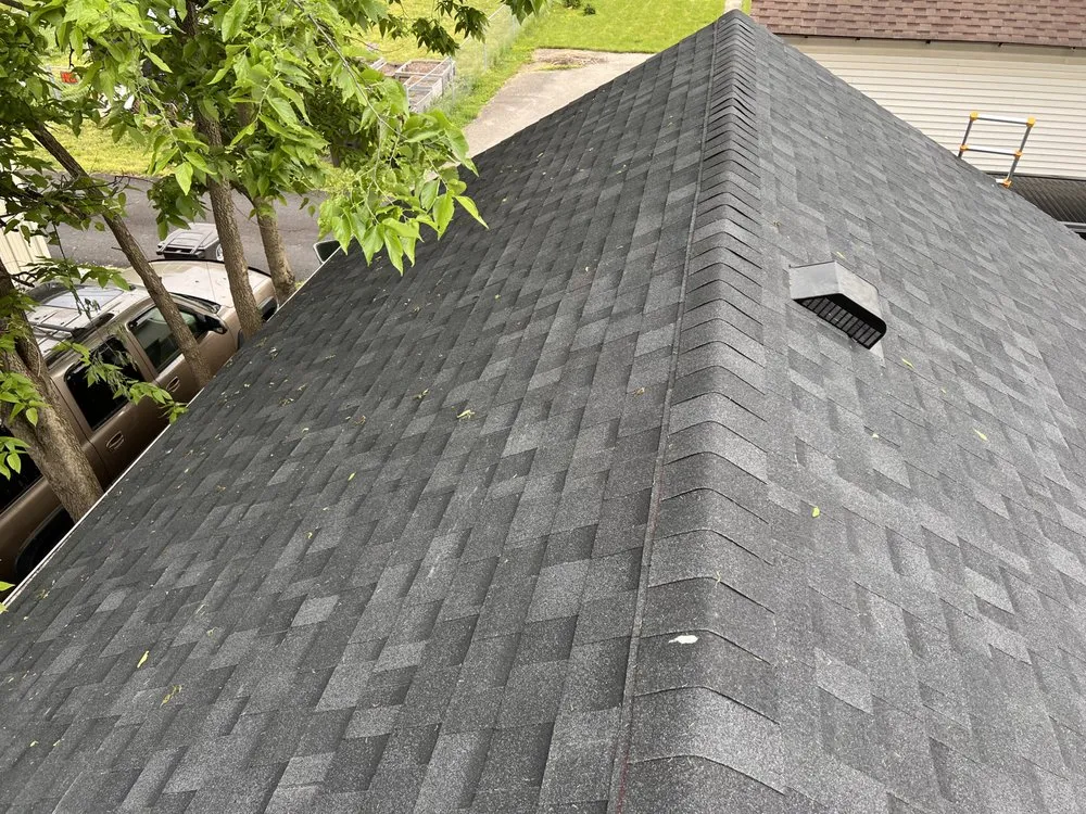 Slide of Spire Roofing & Exteriors