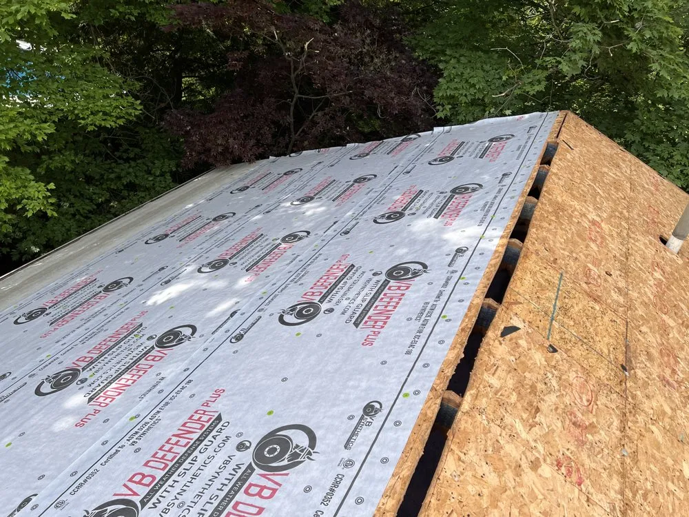 Slide of Spire Roofing & Exteriors