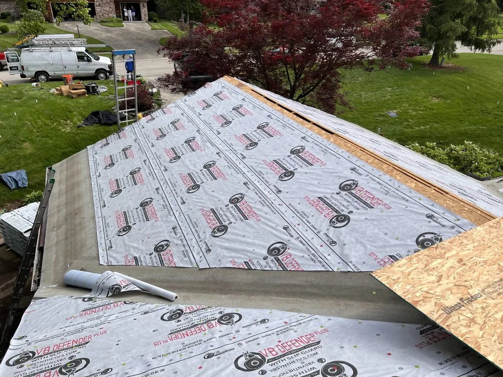 Slide of Spire Roofing & Exteriors