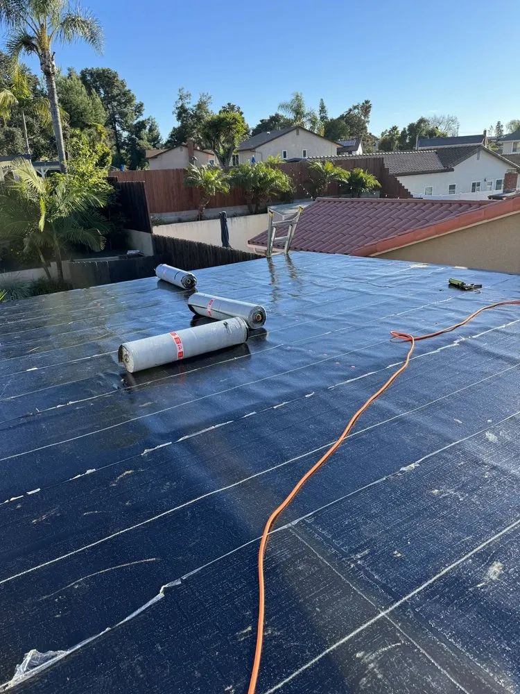 Slide of Spootless Roofing