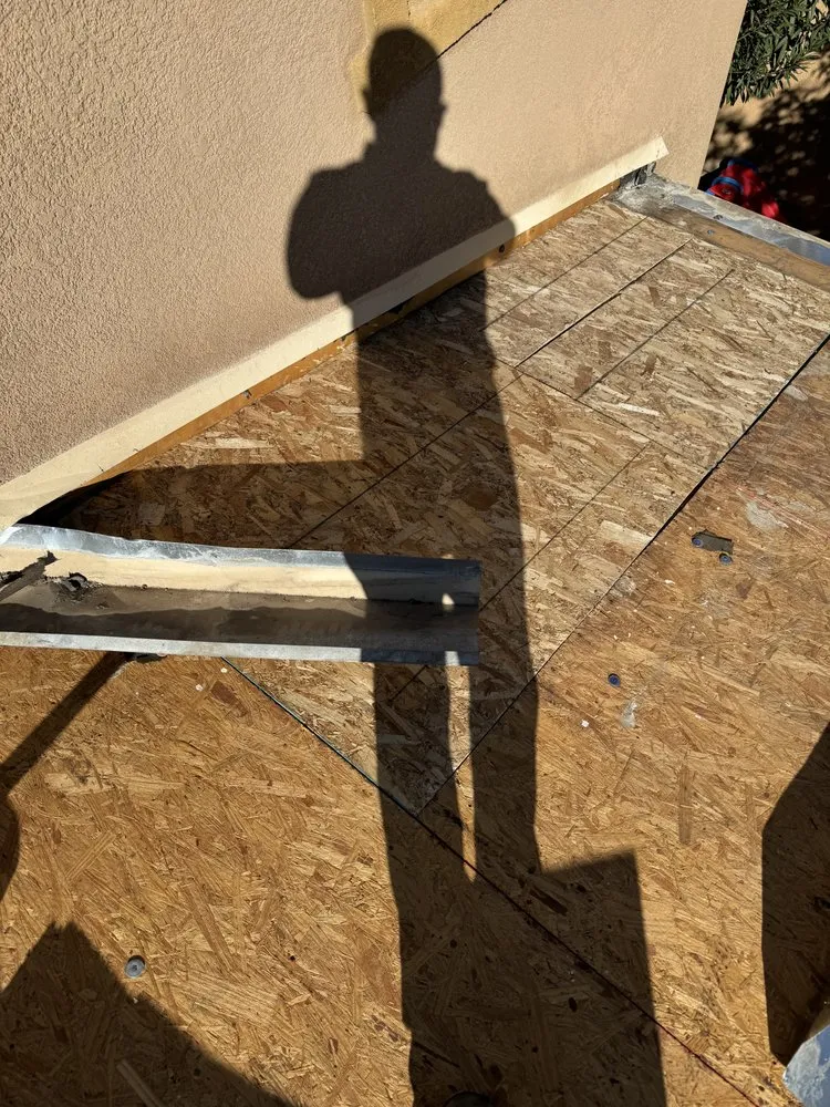 Slide of Spootless Roofing