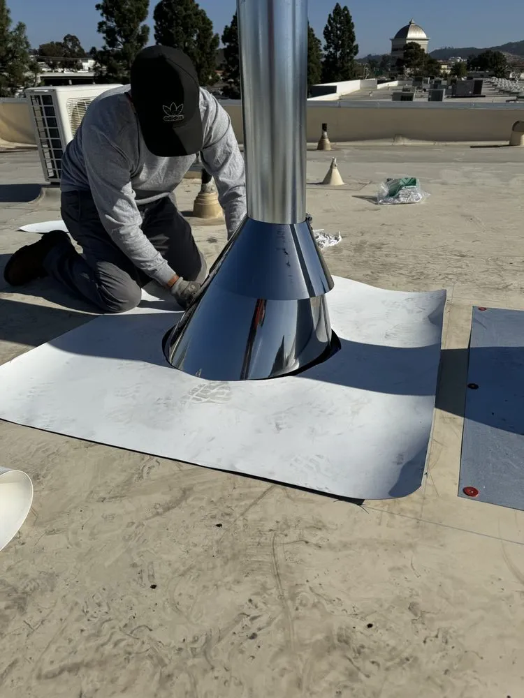 Slide of Spootless Roofing