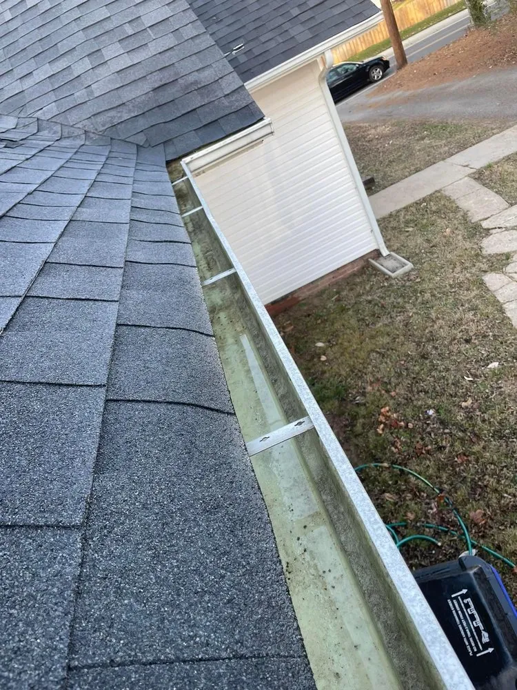 Slide of Spootless Roofing