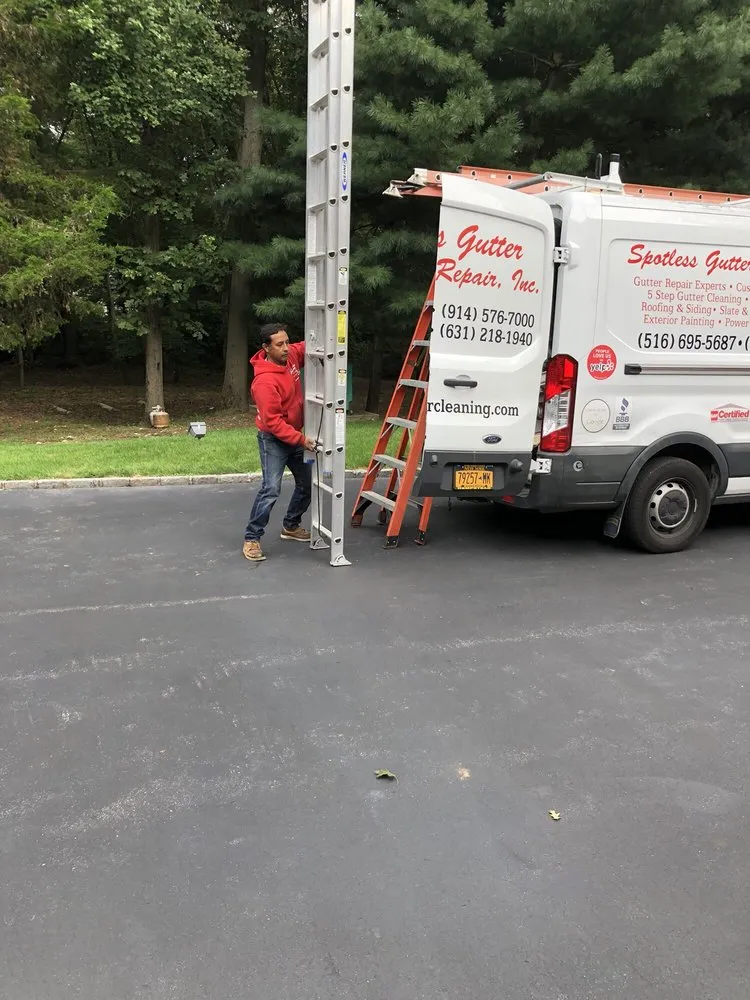 Slide of Spotless Gutter Cleaning & Repair