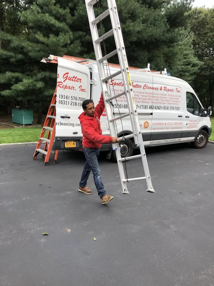 Slide of Spotless Gutter Cleaning & Repair