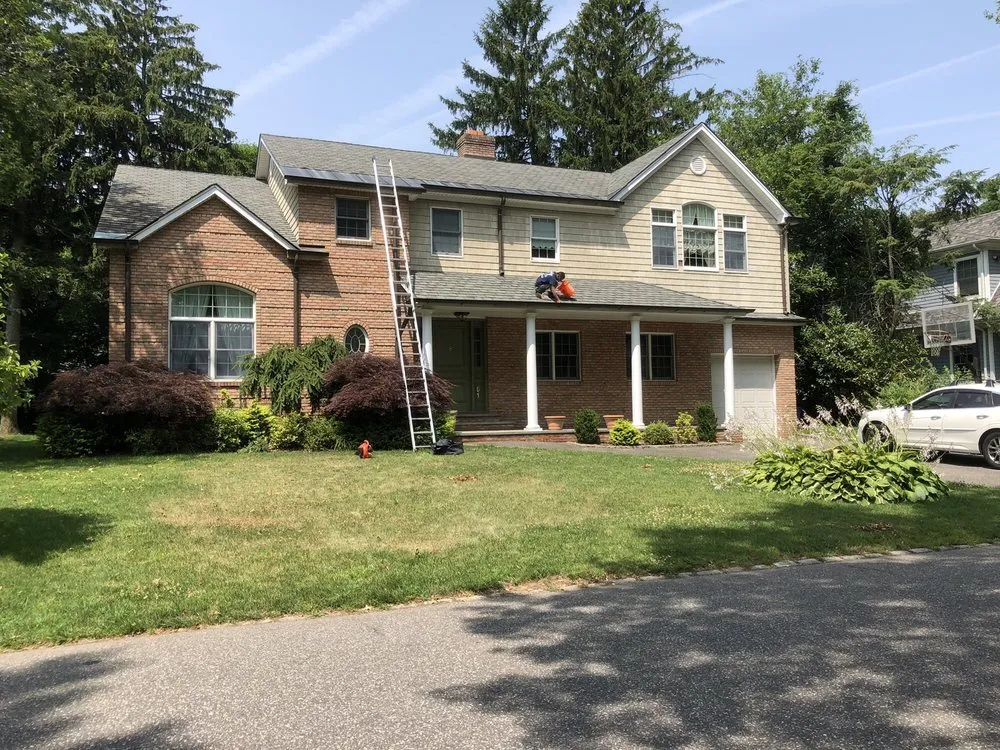 Slide of Spotless Gutter Cleaning & Repair