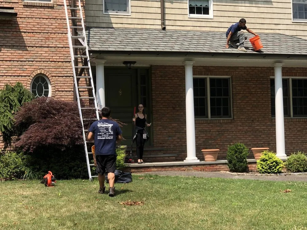 Slide of Spotless Gutter Cleaning & Repair