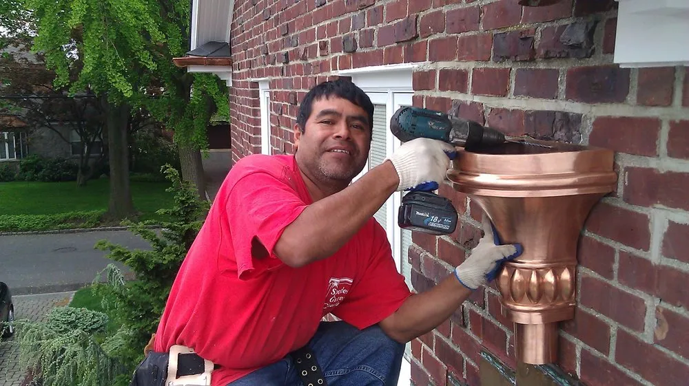 Slide of Spotless Gutter Cleaning & Repair